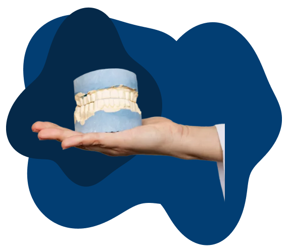 TMJ and TMD treatments being held in hand